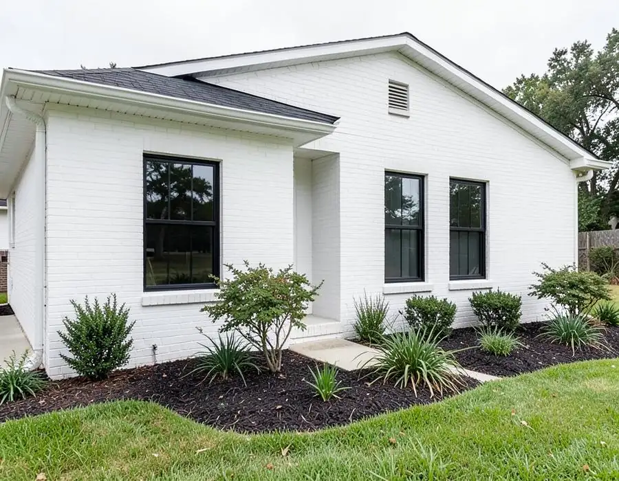 Renovated white brick home
